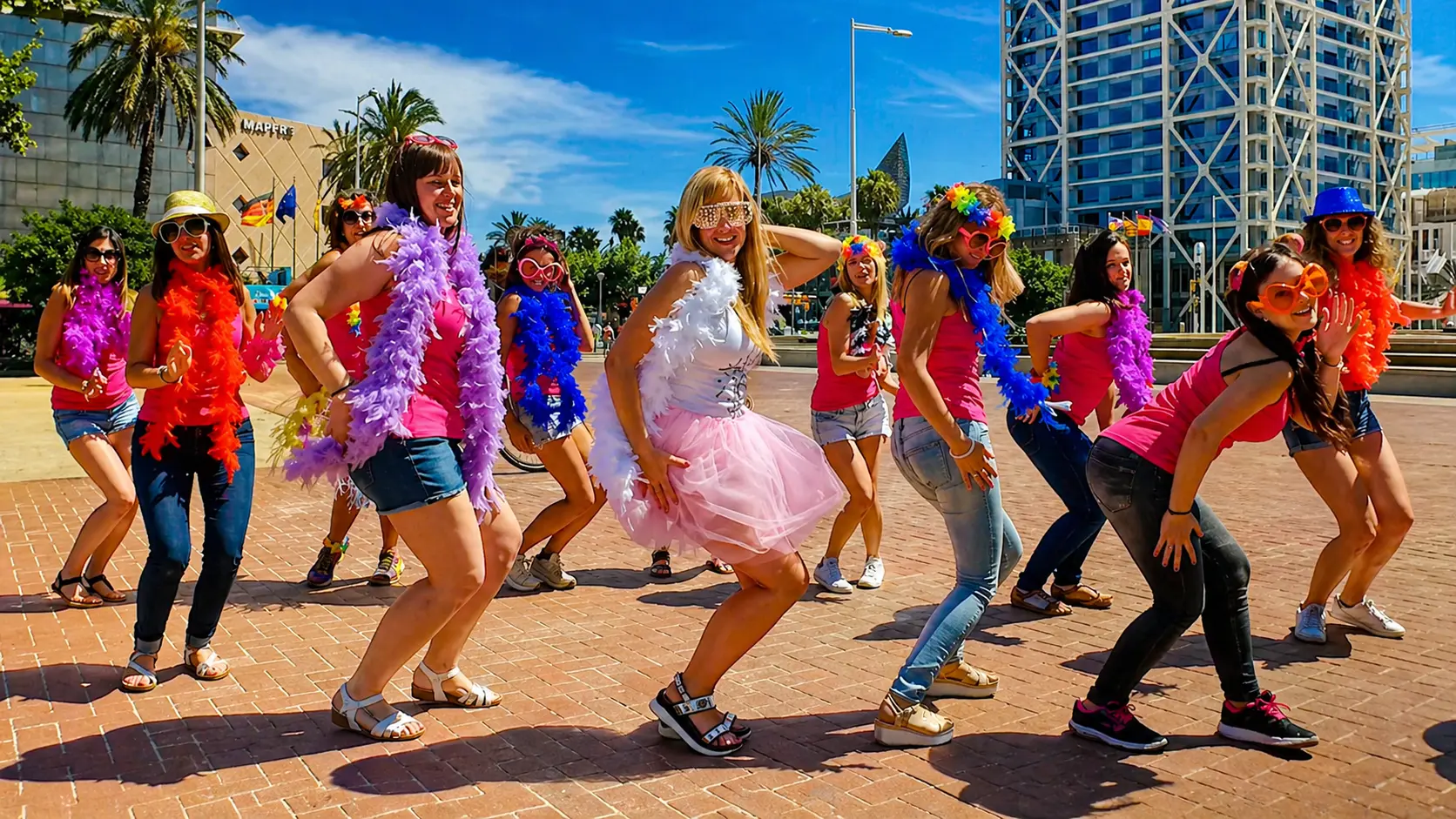 Fun group choreography during a hen party music video in Barcelona