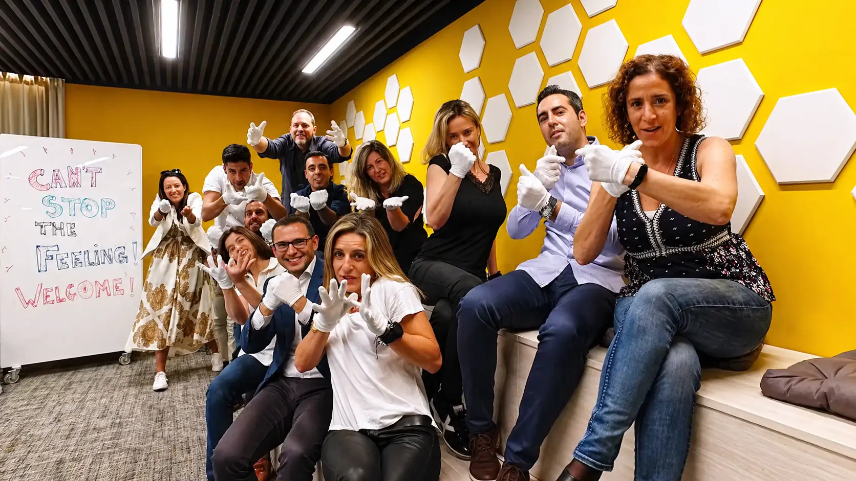 Company team celebrating during an office lip dub recording