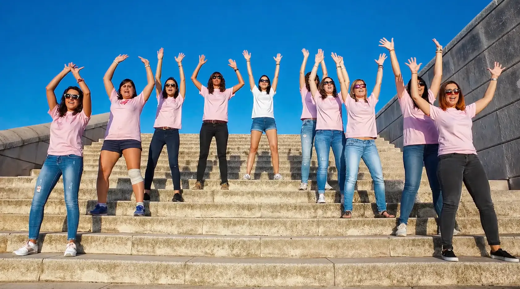 Hen party group celebrating together during their lip dub recording