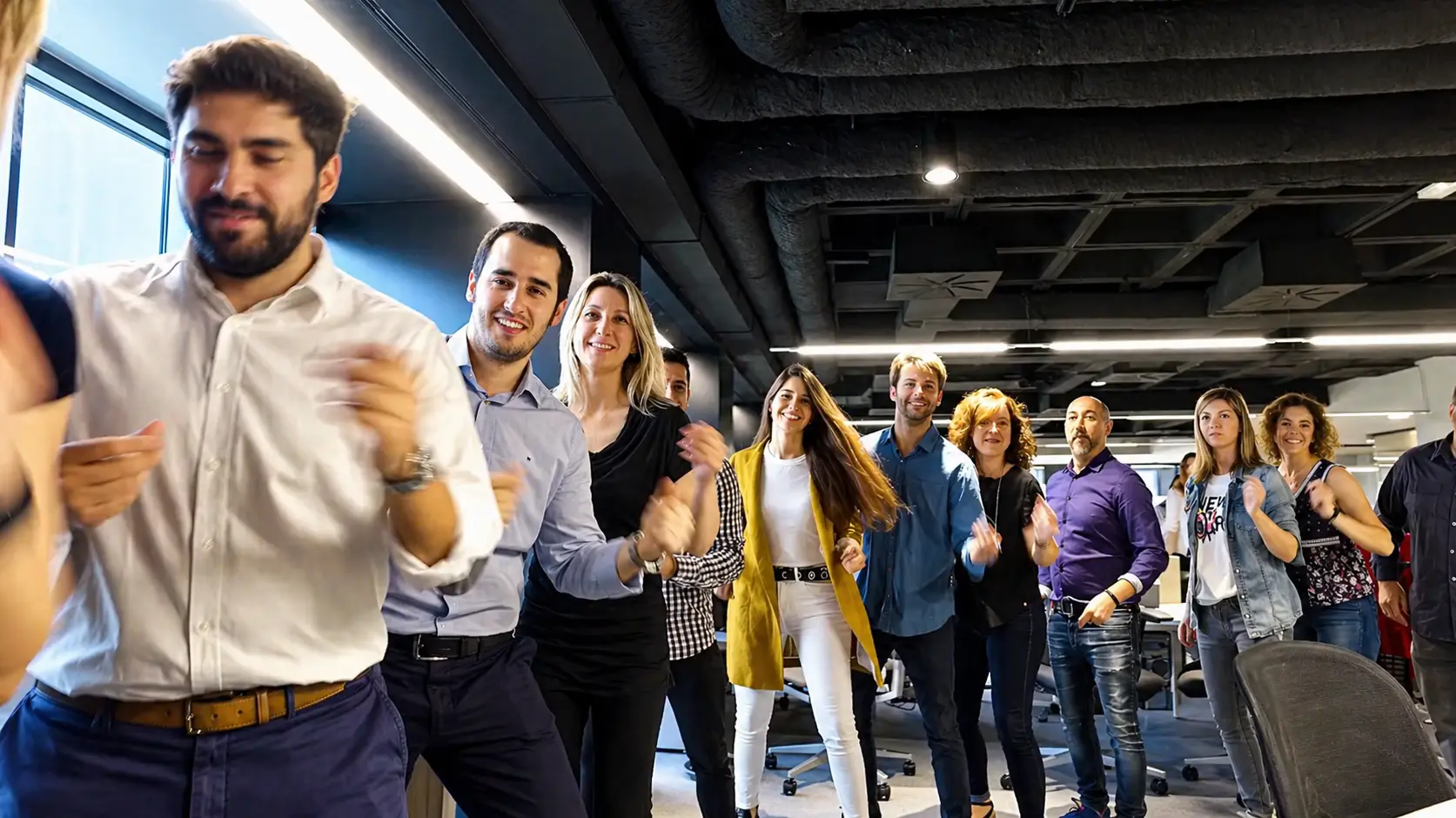 Employees taking part in a musical team-building choreography